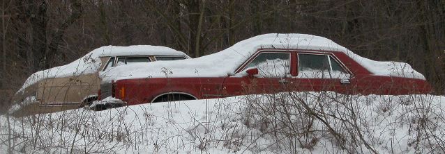 Rusty Snow Covered Cars